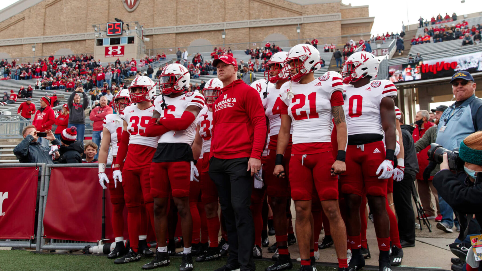 Scott Frost leads Nebraska onto the field