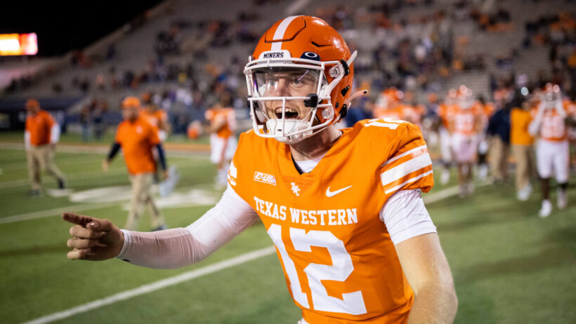 UTEP Miners quarterback Gavin Hardison celebrates after defeating the Rice Owls