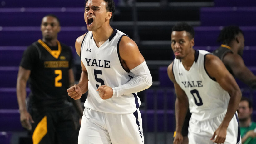 Yale Bulldogs guard Azar Swain celebrating a made basket