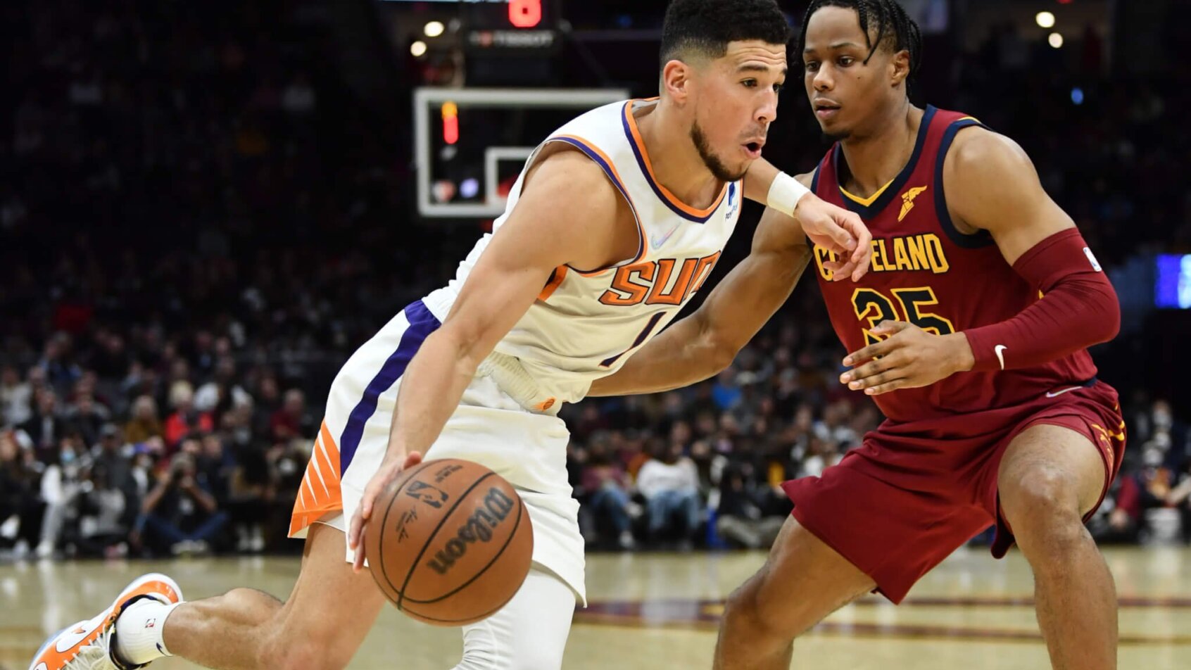 Devin Booker drives to the hoop