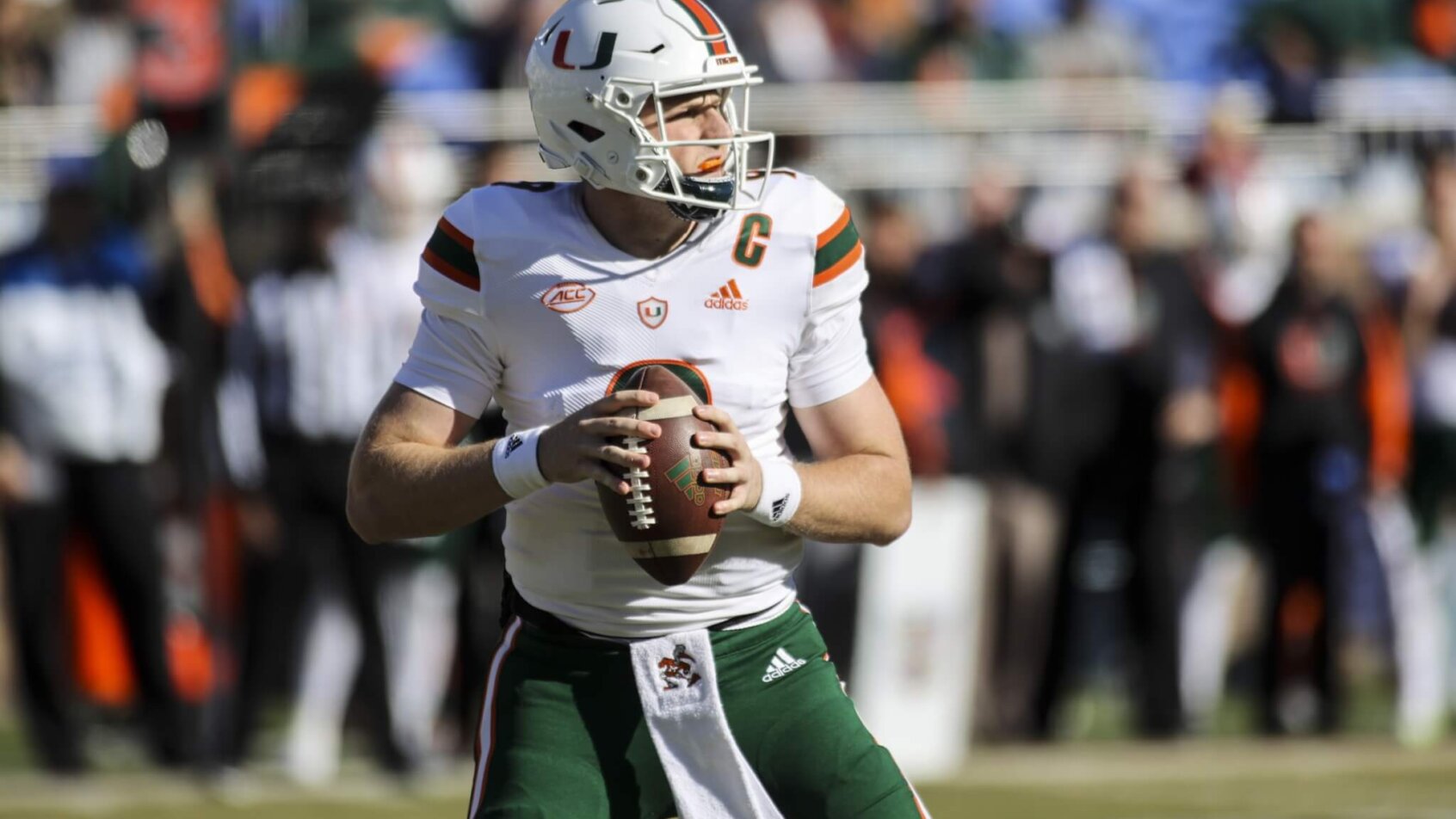 Miami Hurricanes quarterback Tyler Van Dyke, a 2022 Heisman longshot, with the ball