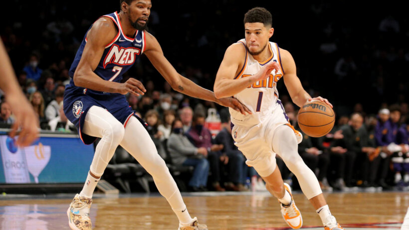 Kevin Durant and Suns G Devin Booker.