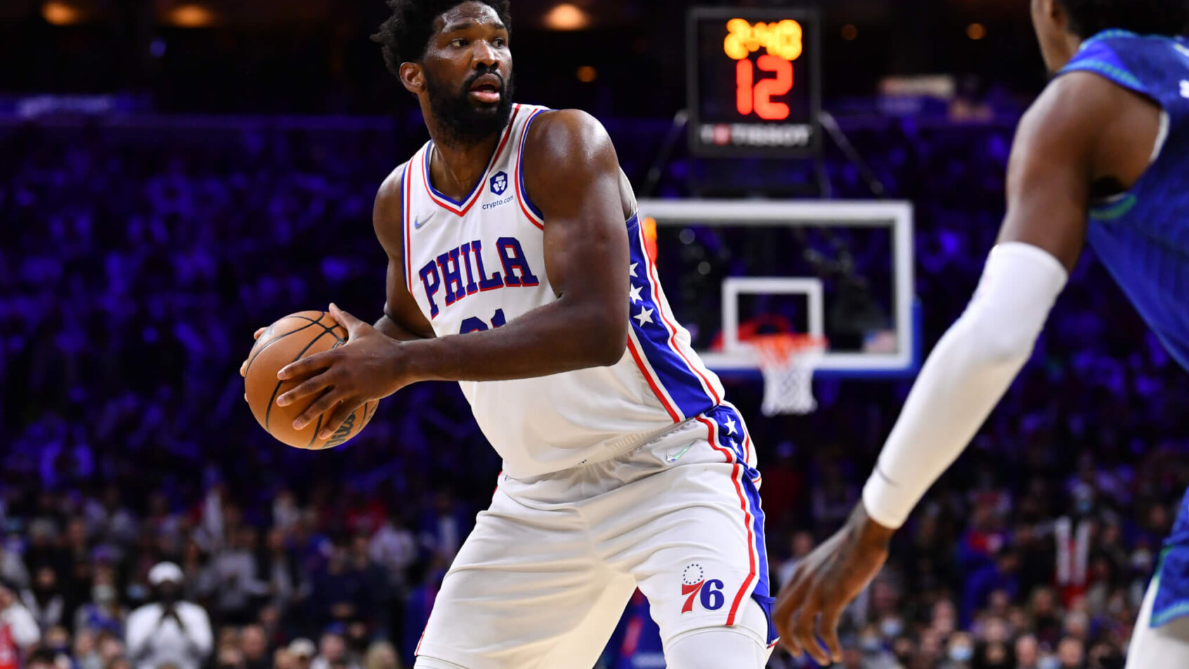 Joel Embiid looks for a teammate