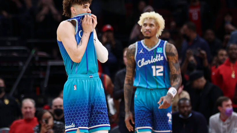 LaMelo Ball wiping face with jersey