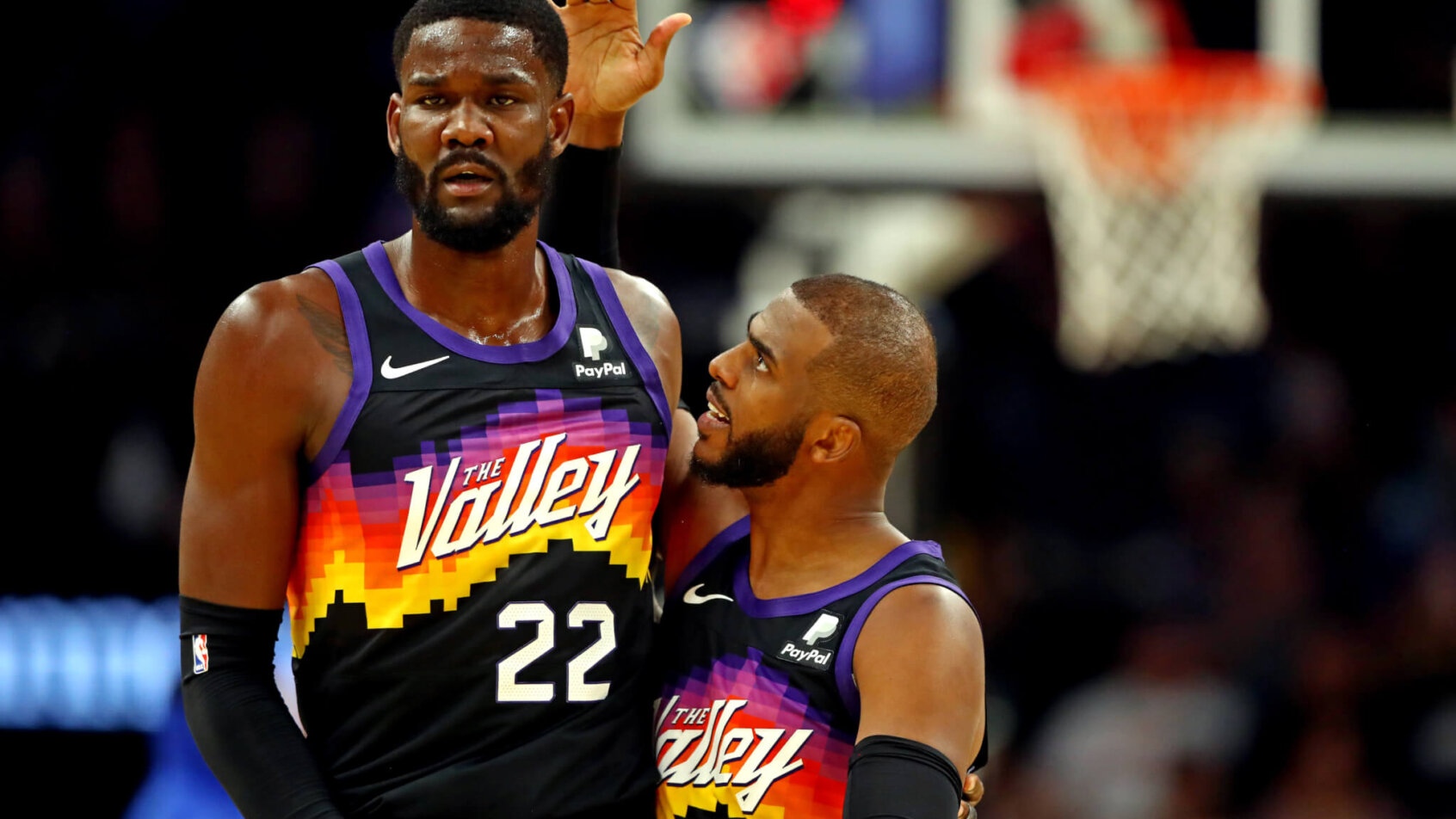 Deandre Ayton and Chris Paul celebrate