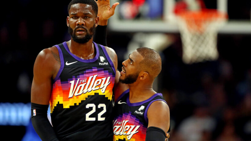Deandre Ayton and Chris Paul celebrate