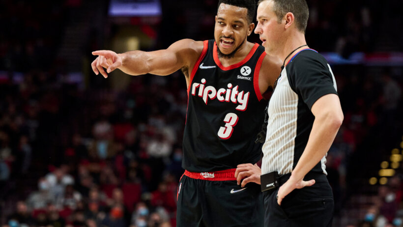 CJ McCollum talking to referee