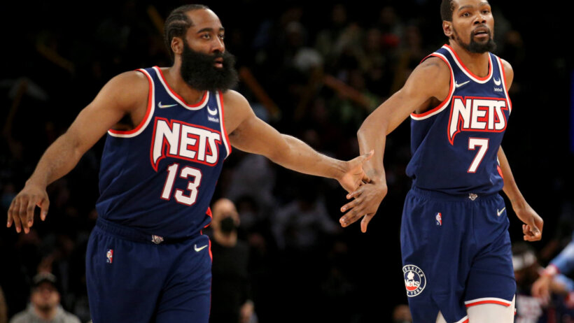 James Harden and Kevin Durant give each other five