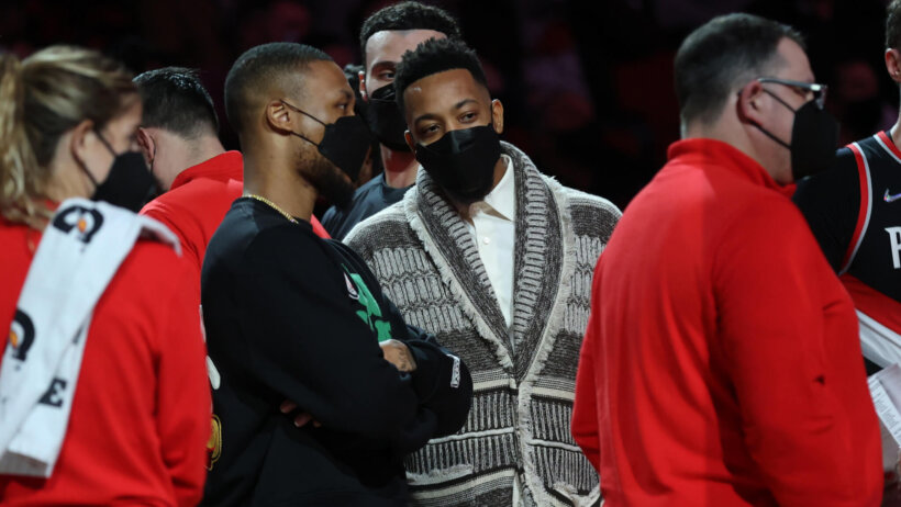 Damian Lillard and McCollum on bench