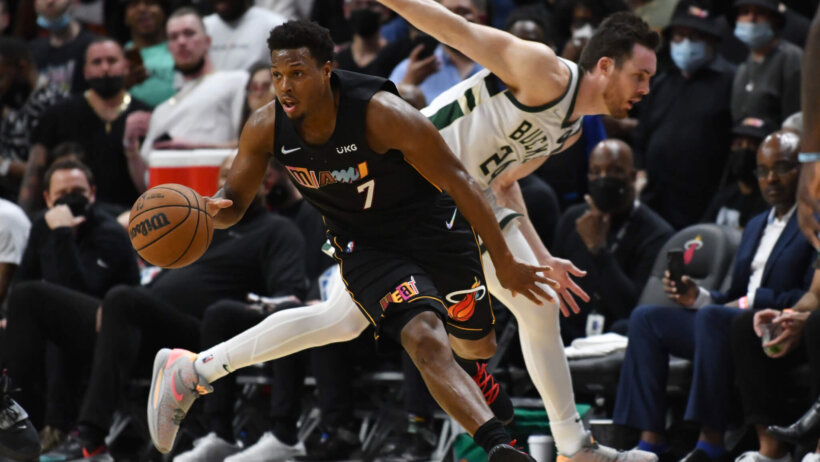 Kyle Lowry dribbling past defender