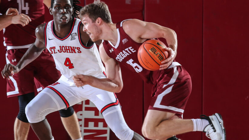 Colgate Raiders guard Tucker Richardson dribbling past a defender