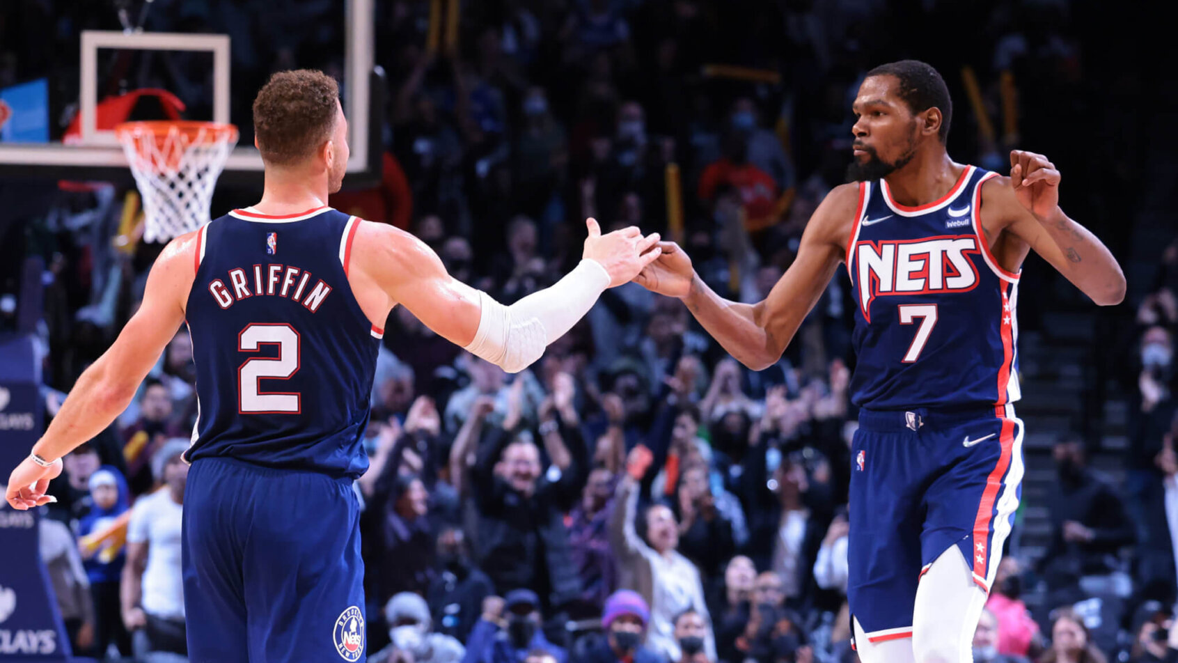 Kevin Durant and Blake Griffin give each other five