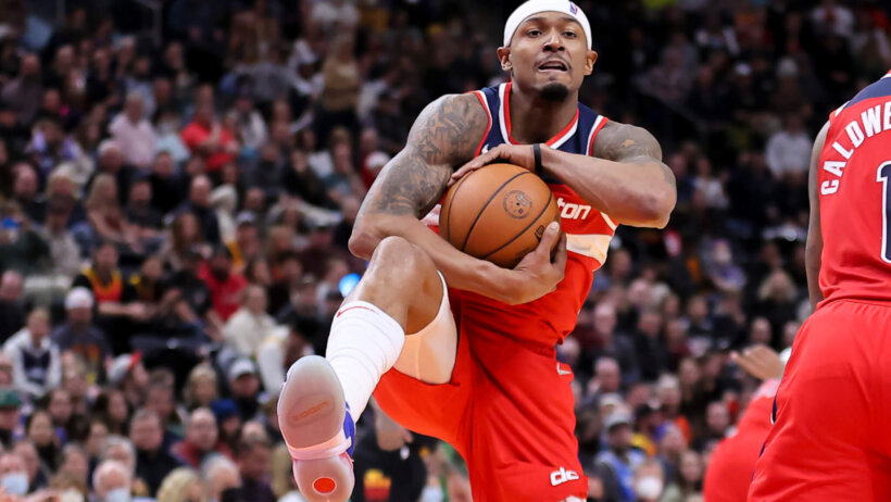 Bradley Beal hugging basketball with two hands