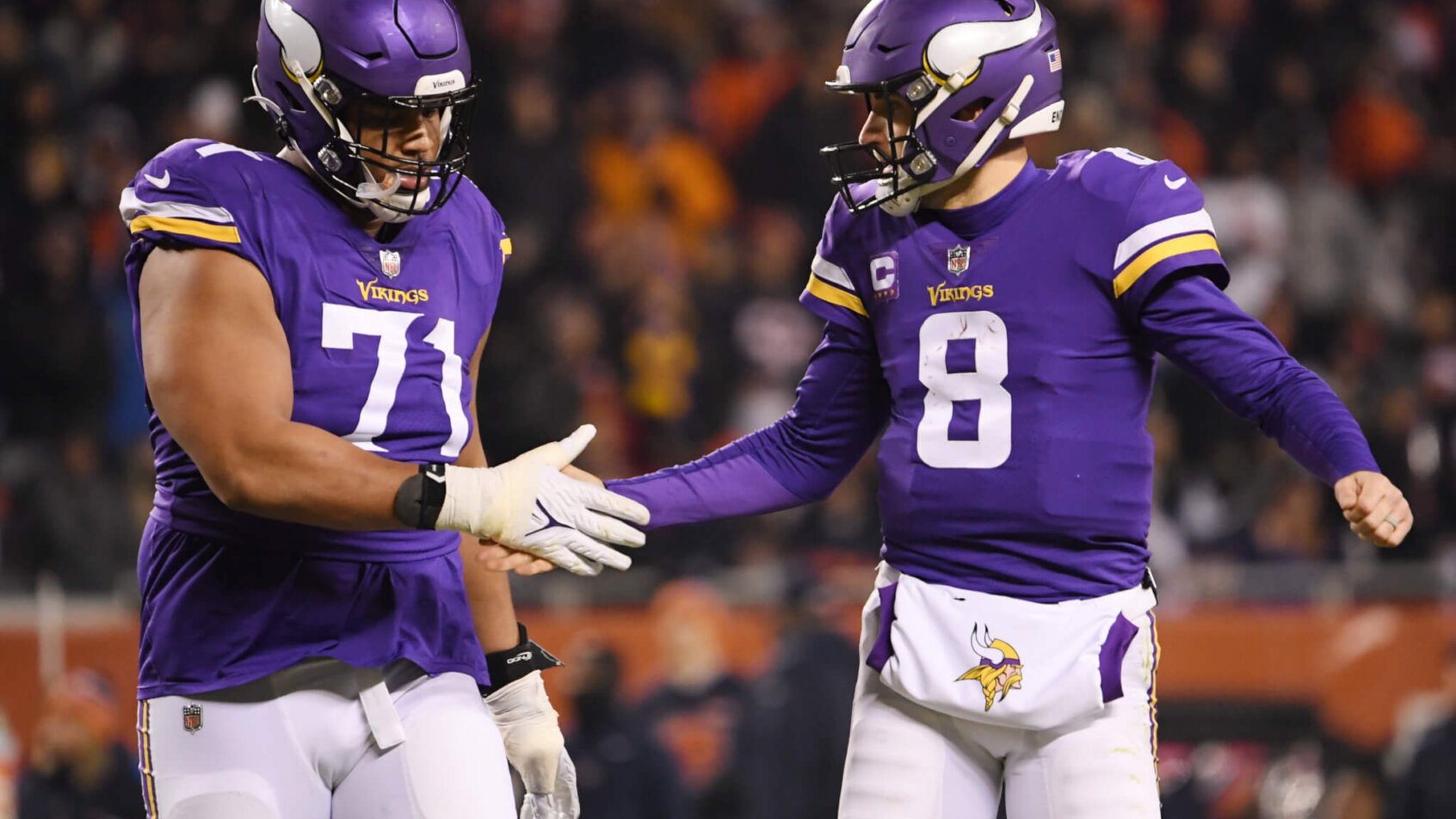 Kirk Cousins and Christian Darrisaw