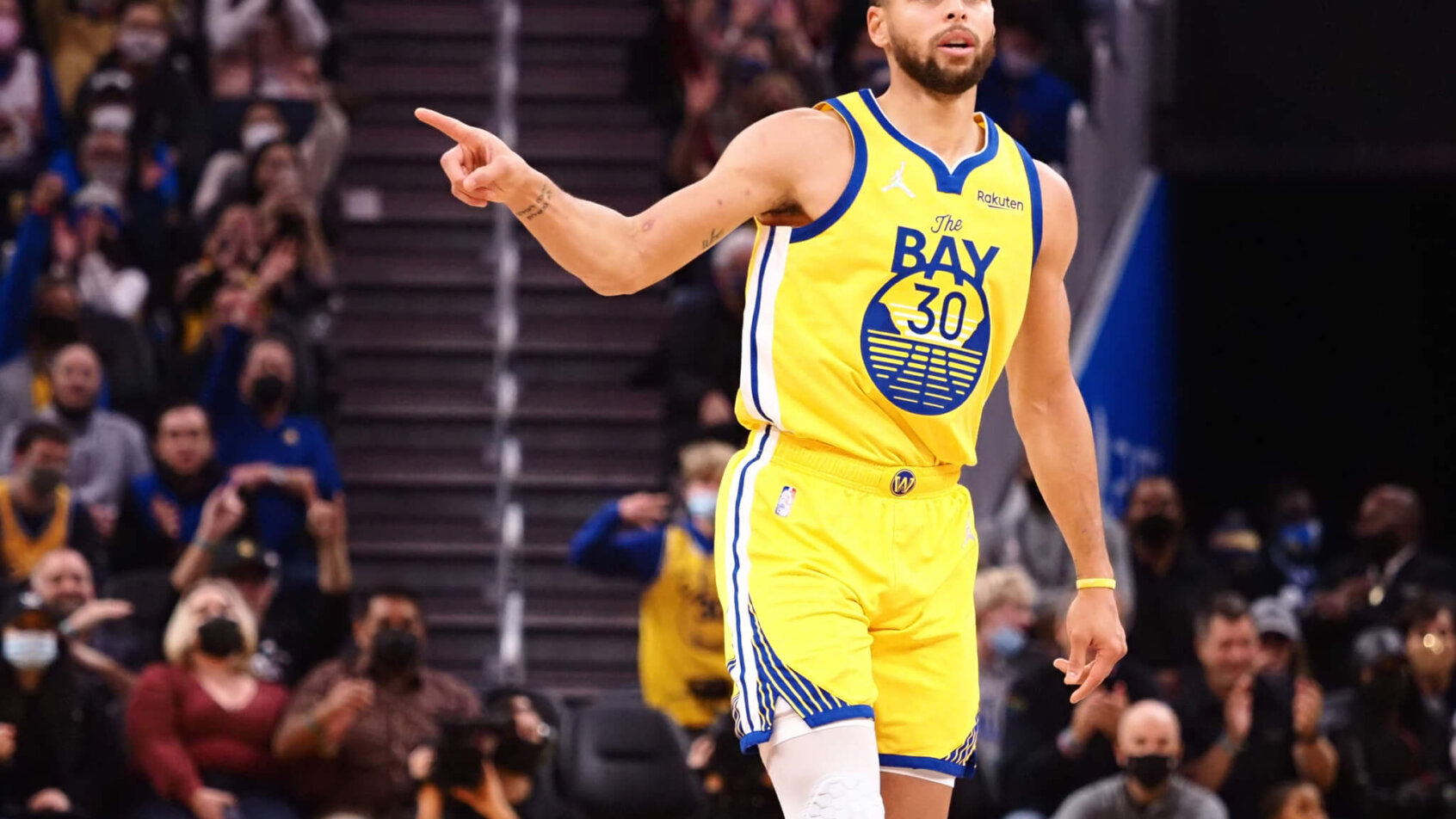 Steph Curry pointing after making shot
