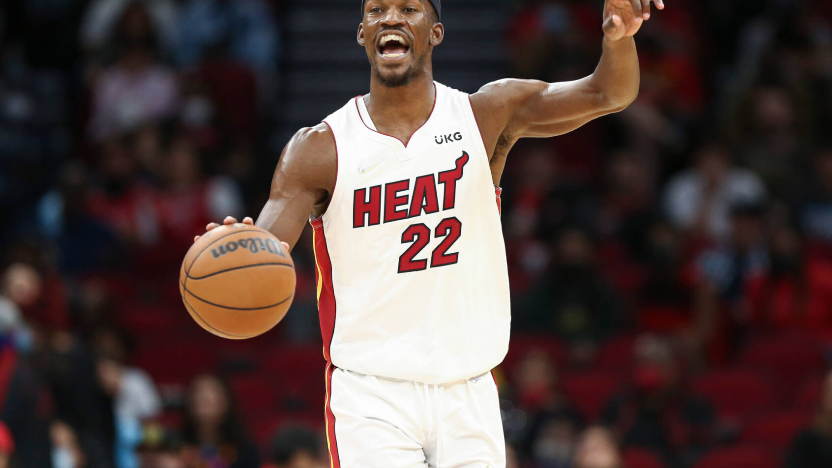 Jimmy Butler dribbling and pointing