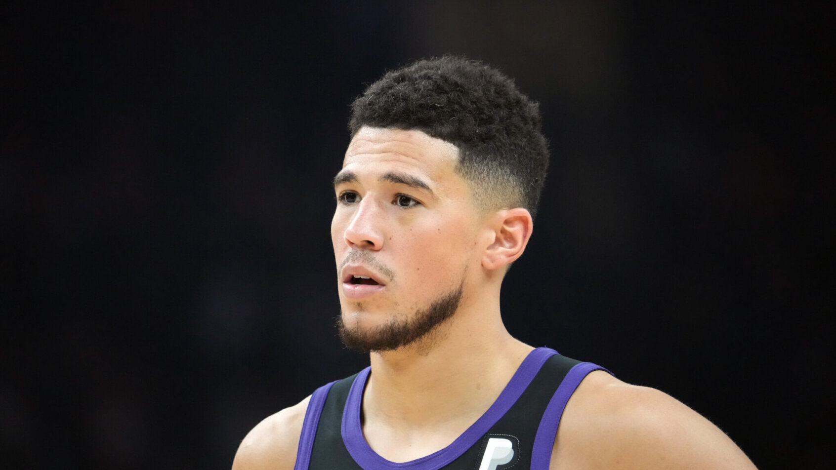 Phoenix Suns guard Devin Booker on the court