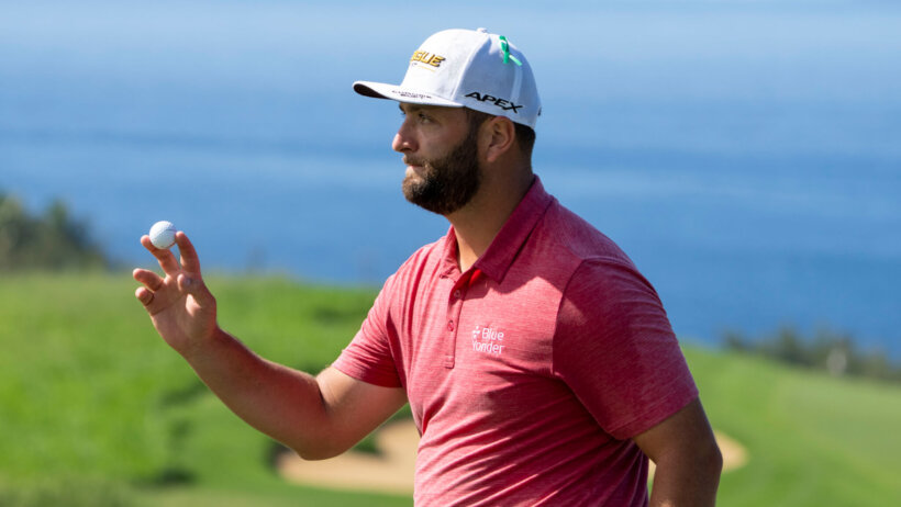 Jon Rahm acknowledges the crowd