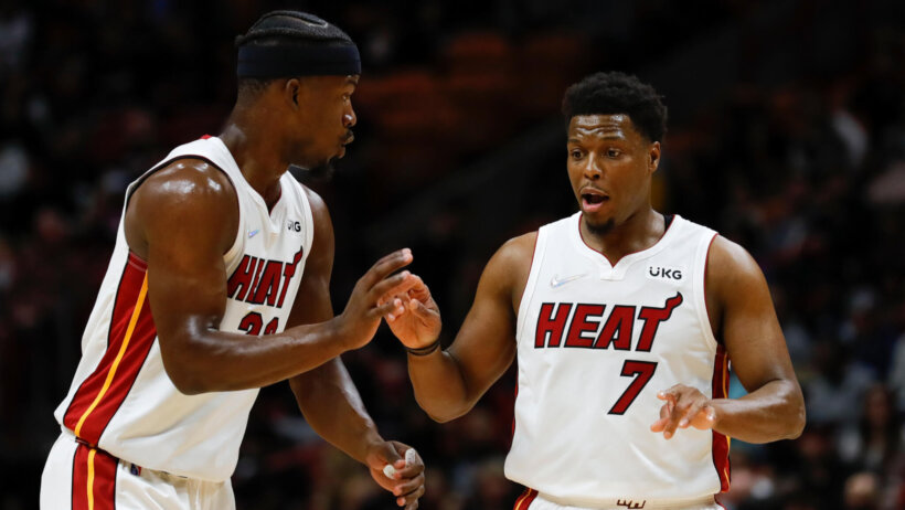 Jimmy Butler talking to Kyle Lowry