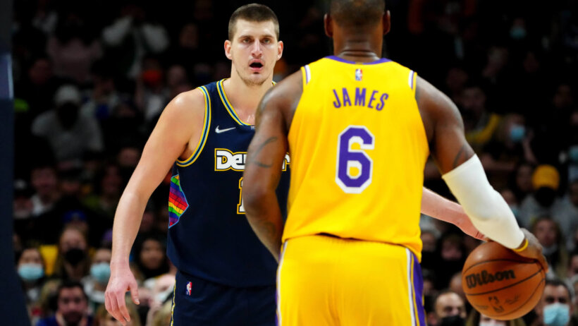 Nikola Jokic defending LeBron James