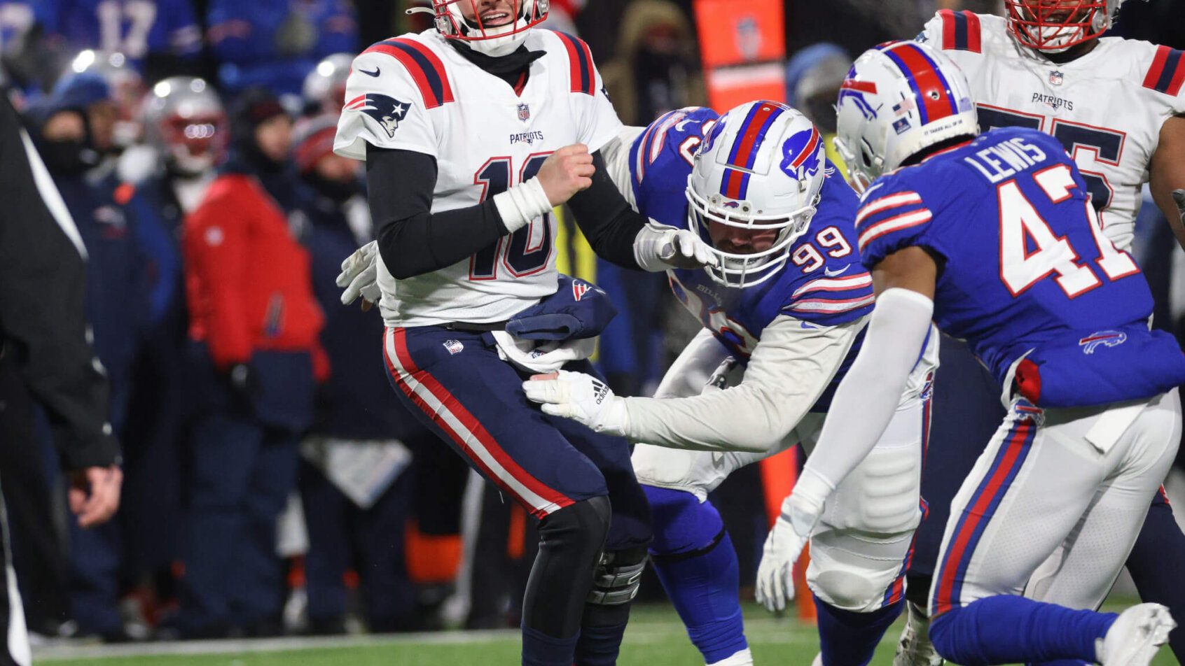 Mac Jones is clobbered by the Bills defense
