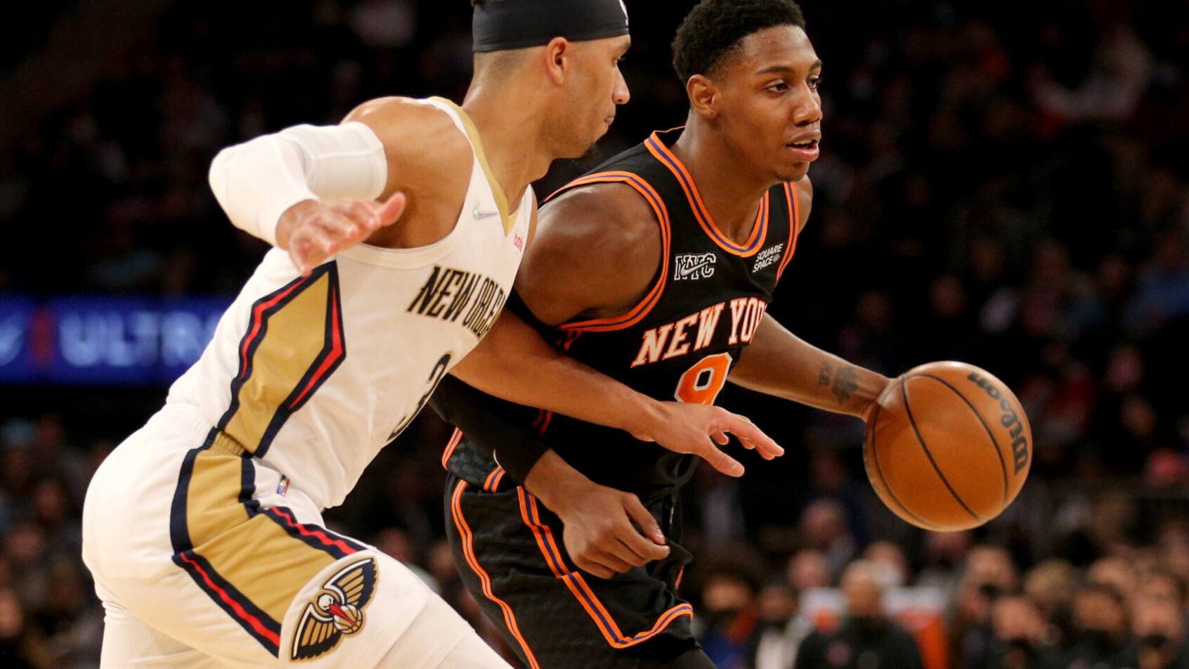 New York Knicks guard RJ Barrett driving to the net during an NBA game.