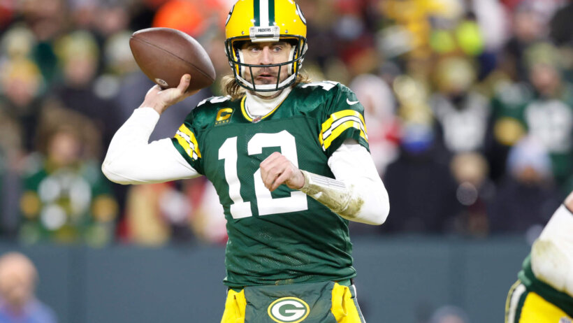 Green Bay Packers quarterback Aaron Rodgers prepares to throw the ball