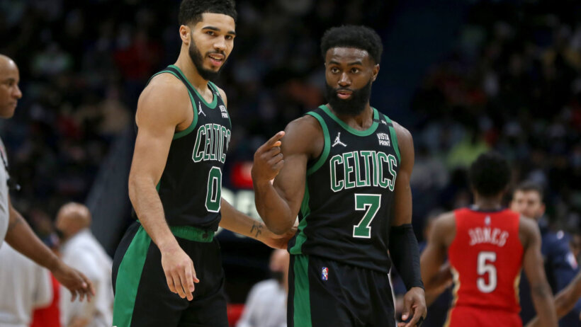 Jayson Tatum talking to Jaylen Brown