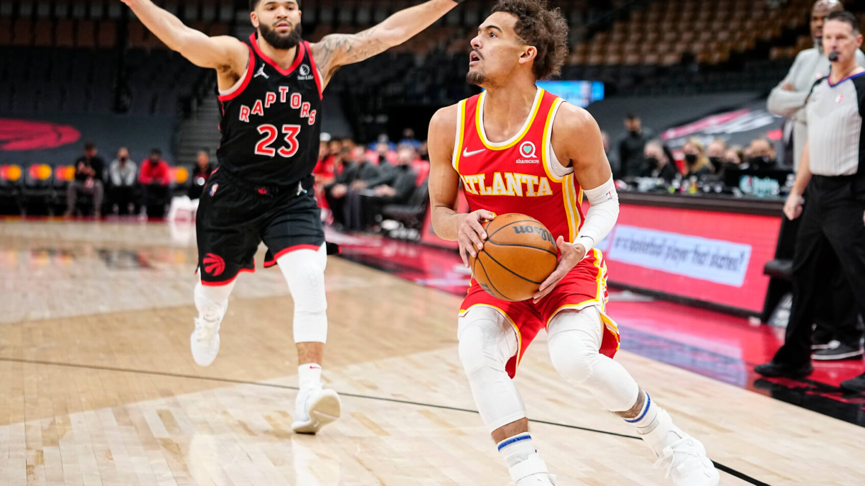 Fred VanVleet running at Trae Young, shooting