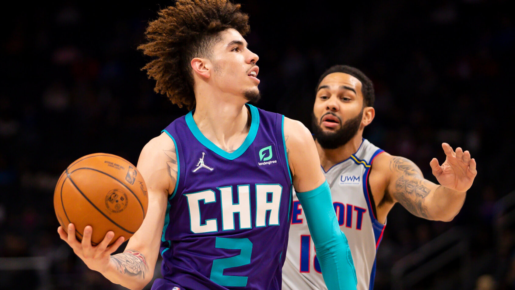 LaMelo Ball driving past defender