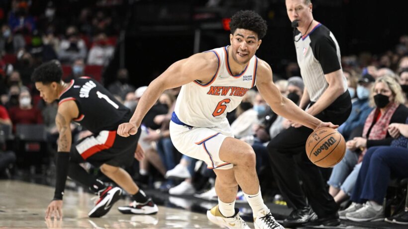 ew York Knicks guard Quentin Grimes steals the basketball during the the second half against Portland Trail Blazers guard Anfernee Simons