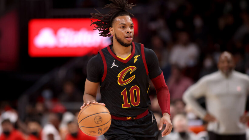 Darius Garland dribbles up court