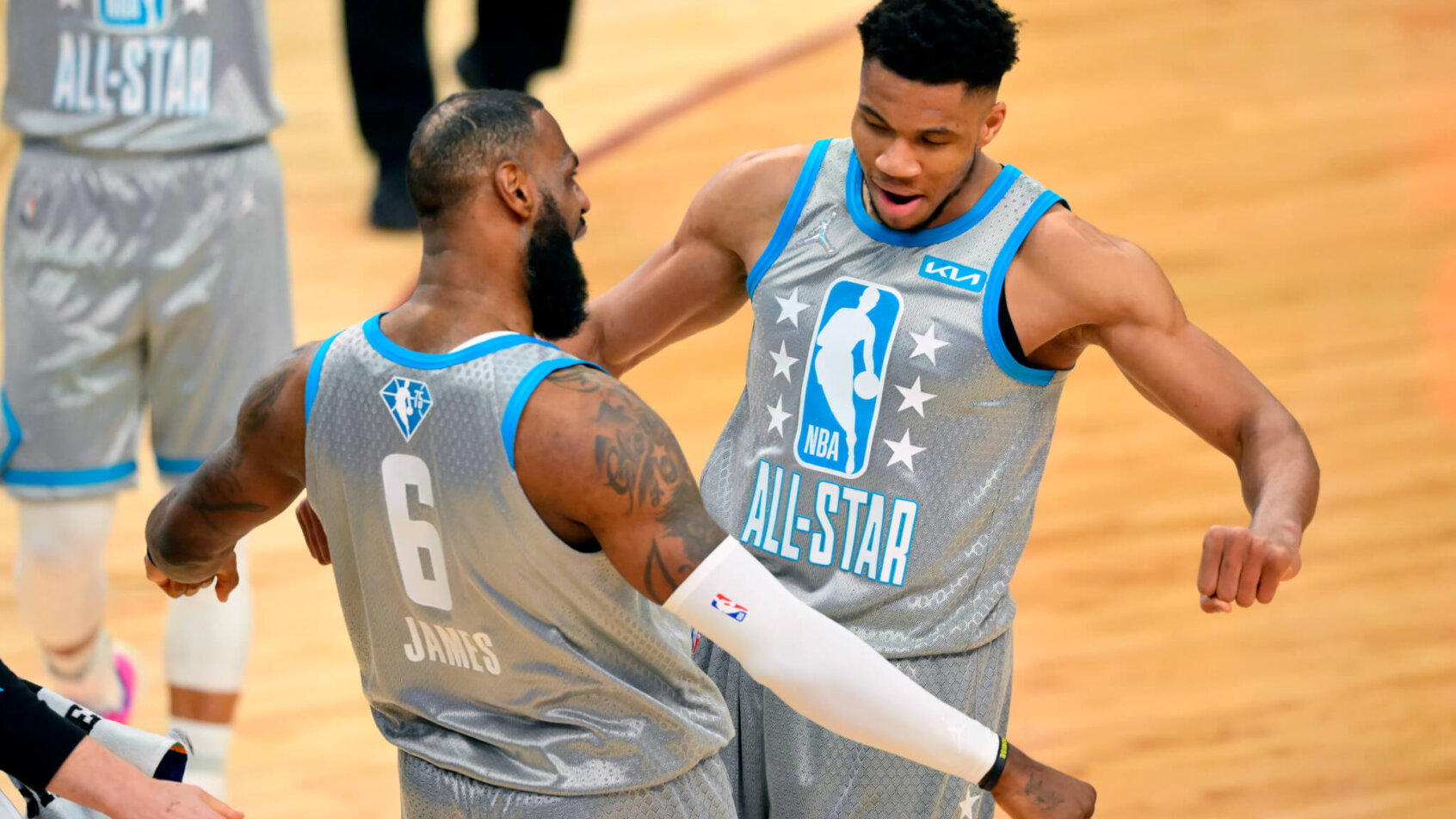 LeBron James and Giannis Antetokounmpo celebrate at the All-Star Game.