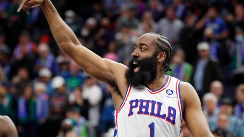 James Harden holding arm up after taking jumper
