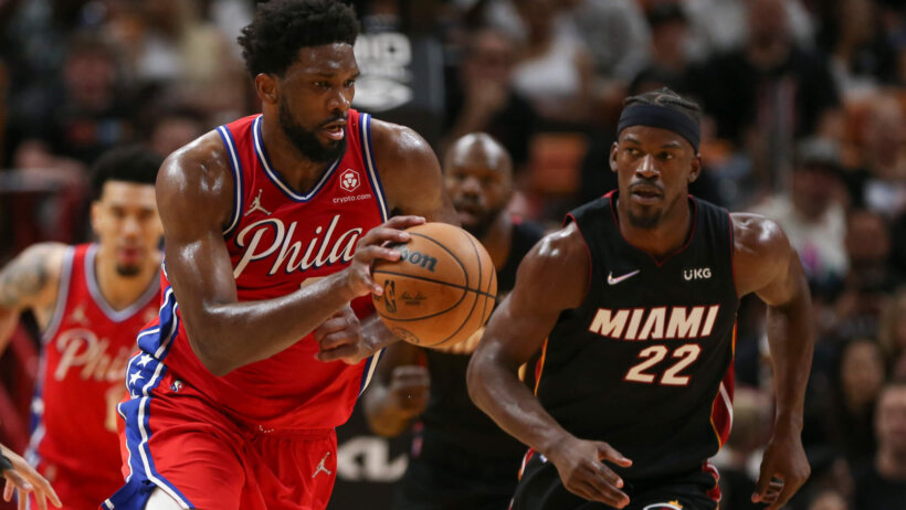 Joel Embiid dribbling, Jimmy Butler chasing