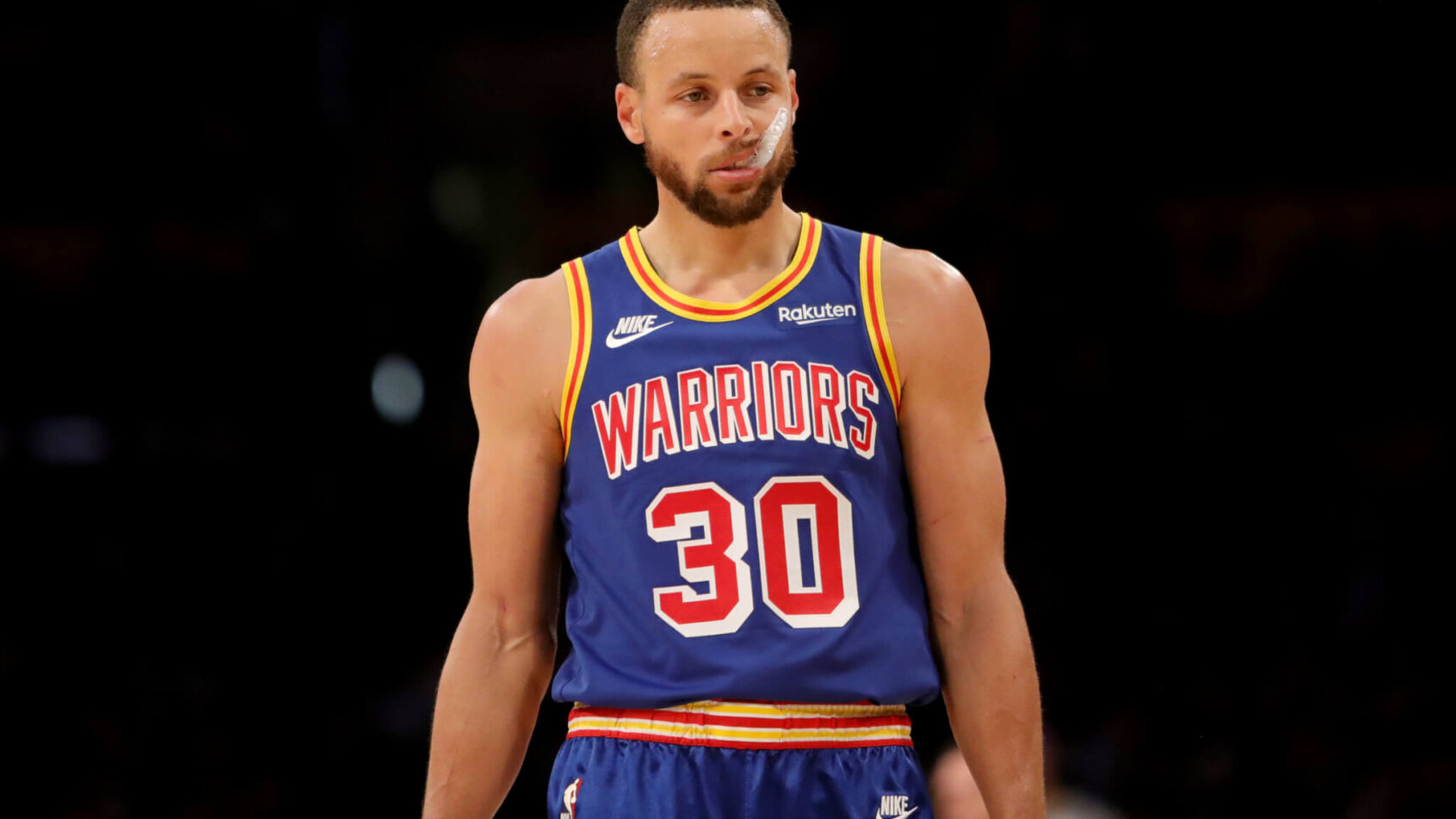Steph Curry biting on mouth guard
