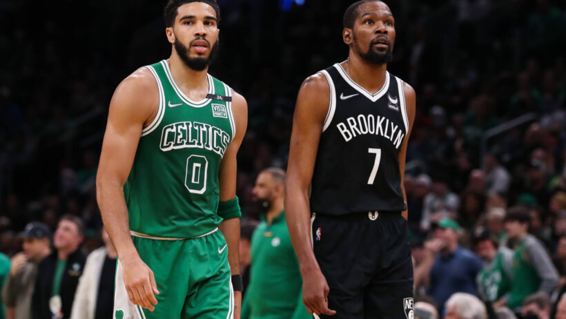Jayson Tatum beside Kevin Durant