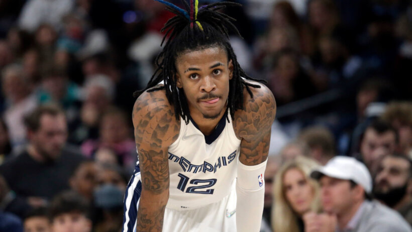 Ja Morant hands on knees
