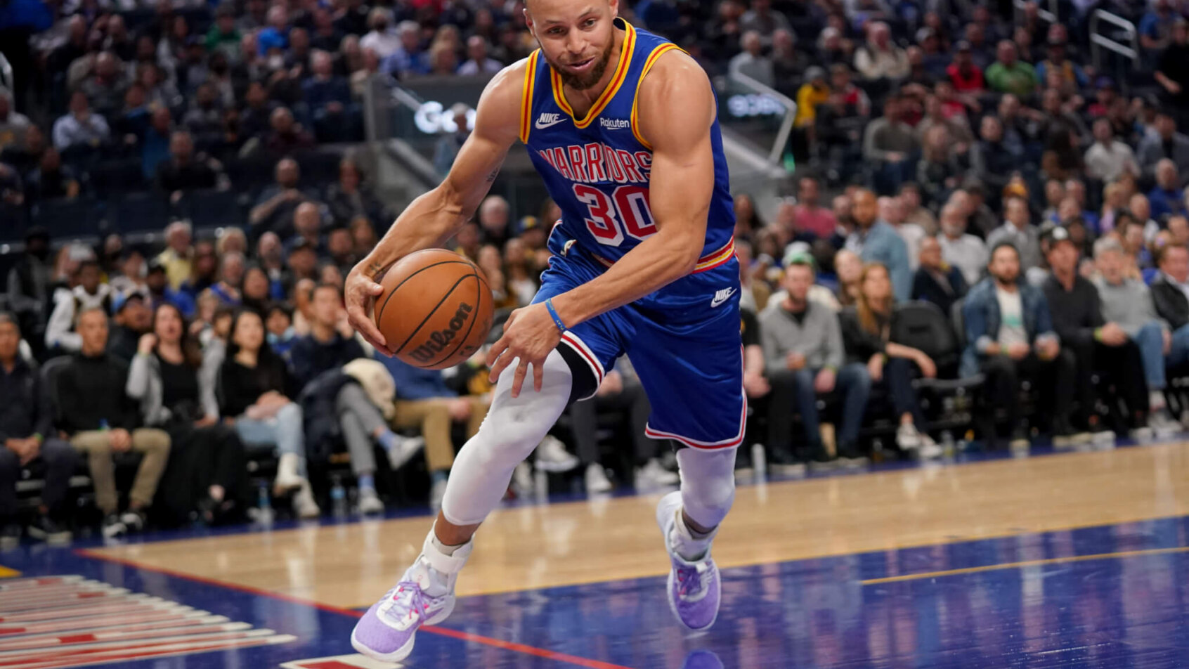 Curry dives for loose ball