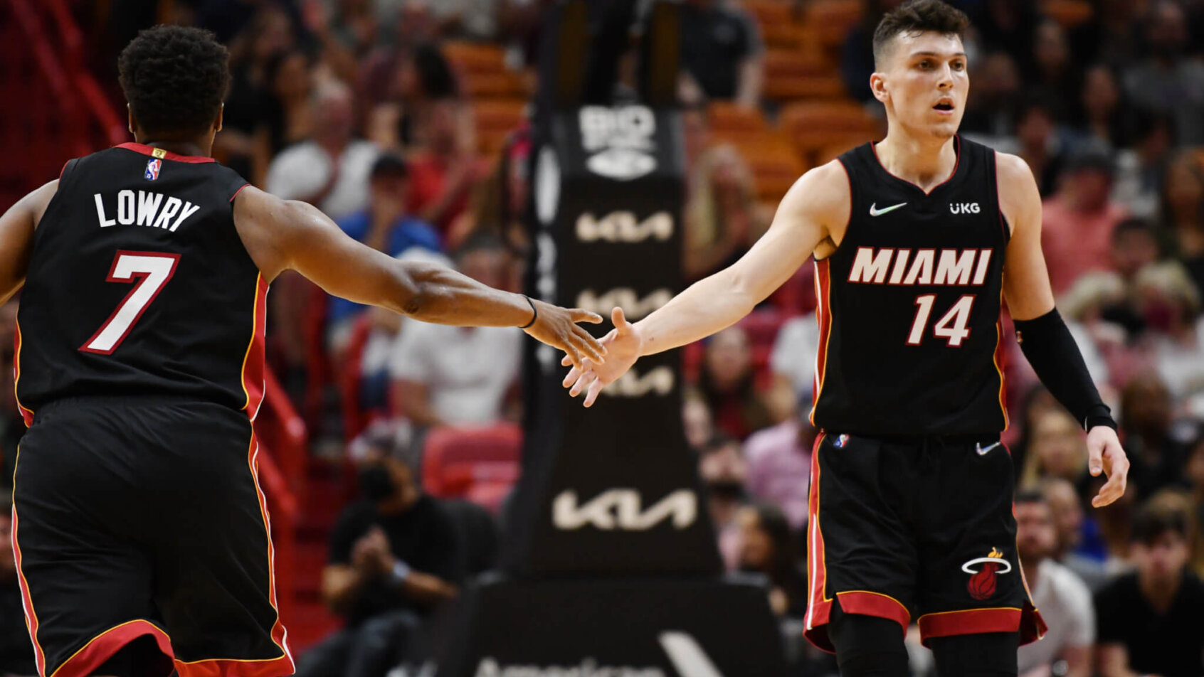 Kyle Lowry and Tyler Herro slap hands
