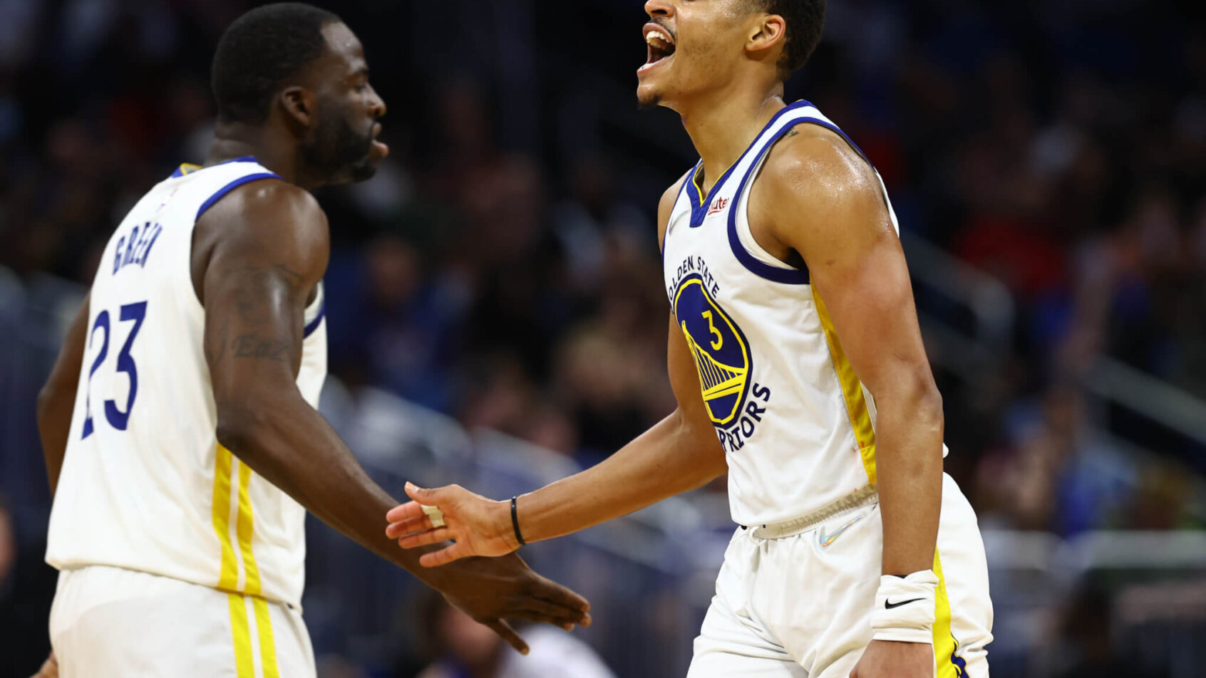 Jordan Poole celebrating