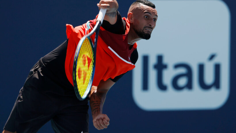 Nick Kyrgios smashes a serve