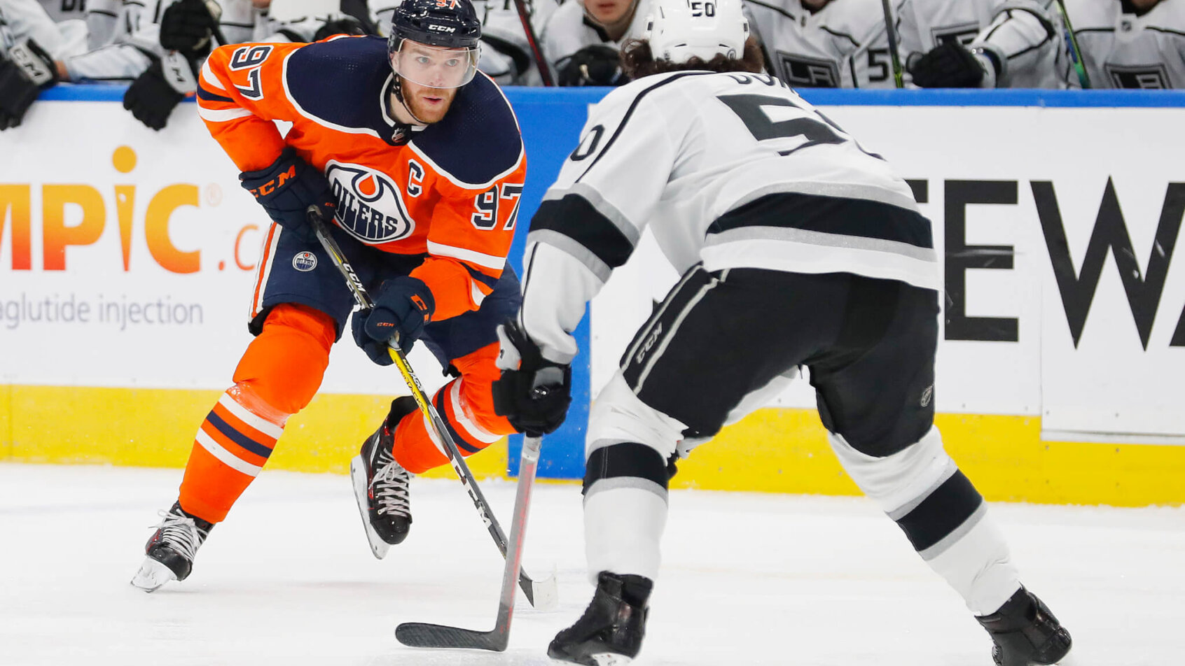 Edmonton Oilers forward Connor McDavid rushing the puck up the ice versus the LA Kings