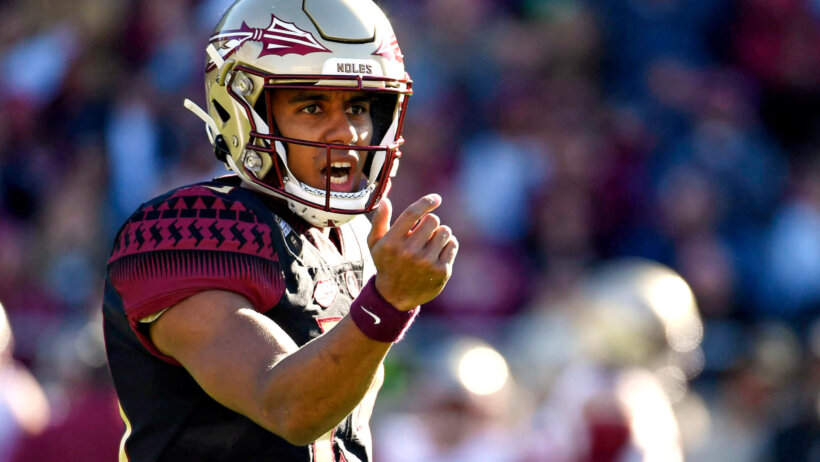 Florida State Seminoles quarterback Jordan Travis directs his offense during the FSU spring game at Doak Campbell Stadium