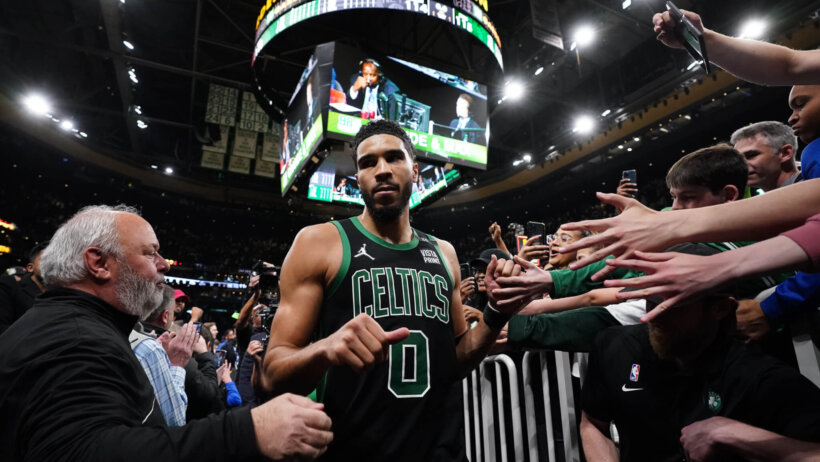 Jayson Tatum walks off court
