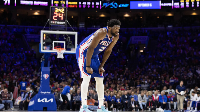 Joel Embiid hands on knees