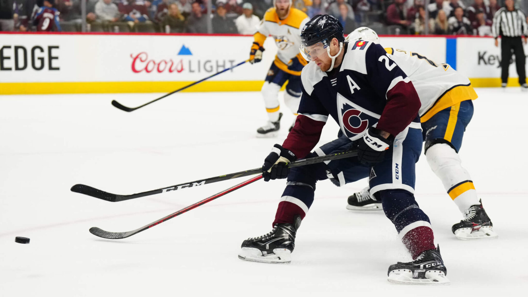Colorado Avalanche center Nathan MacKinnon driving to the net