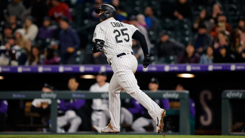 Colorado Rockies first baseman C.J. Cron rounding the bases