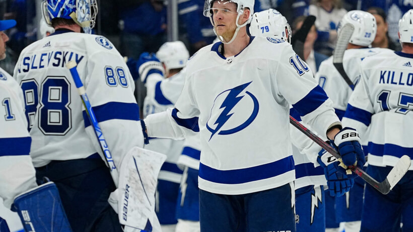 Tampa Bay Lightning forward Corey Perry celebrates a win with goalie Andrei Vasilevskiy