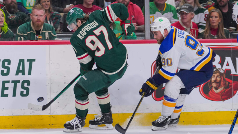 Minnesota Wild left wing Kirill Kaprizov carrying the puck along the boards